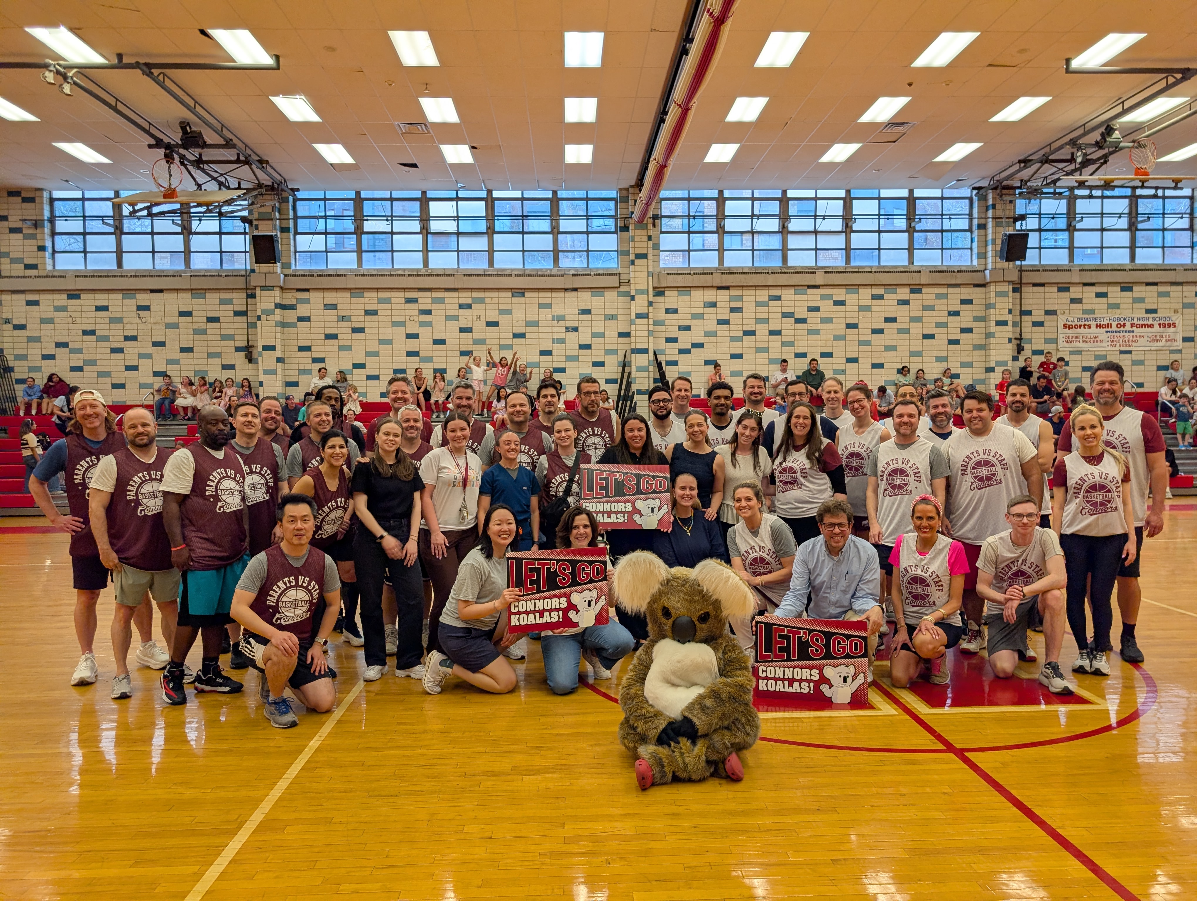 Parents and Staff Basketball Game group photo